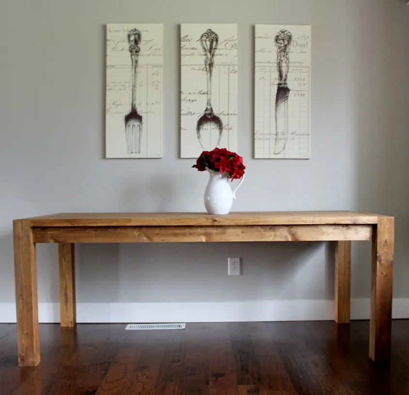 Modern farmhouse dining table made from pine with a pocket hole joinery base.